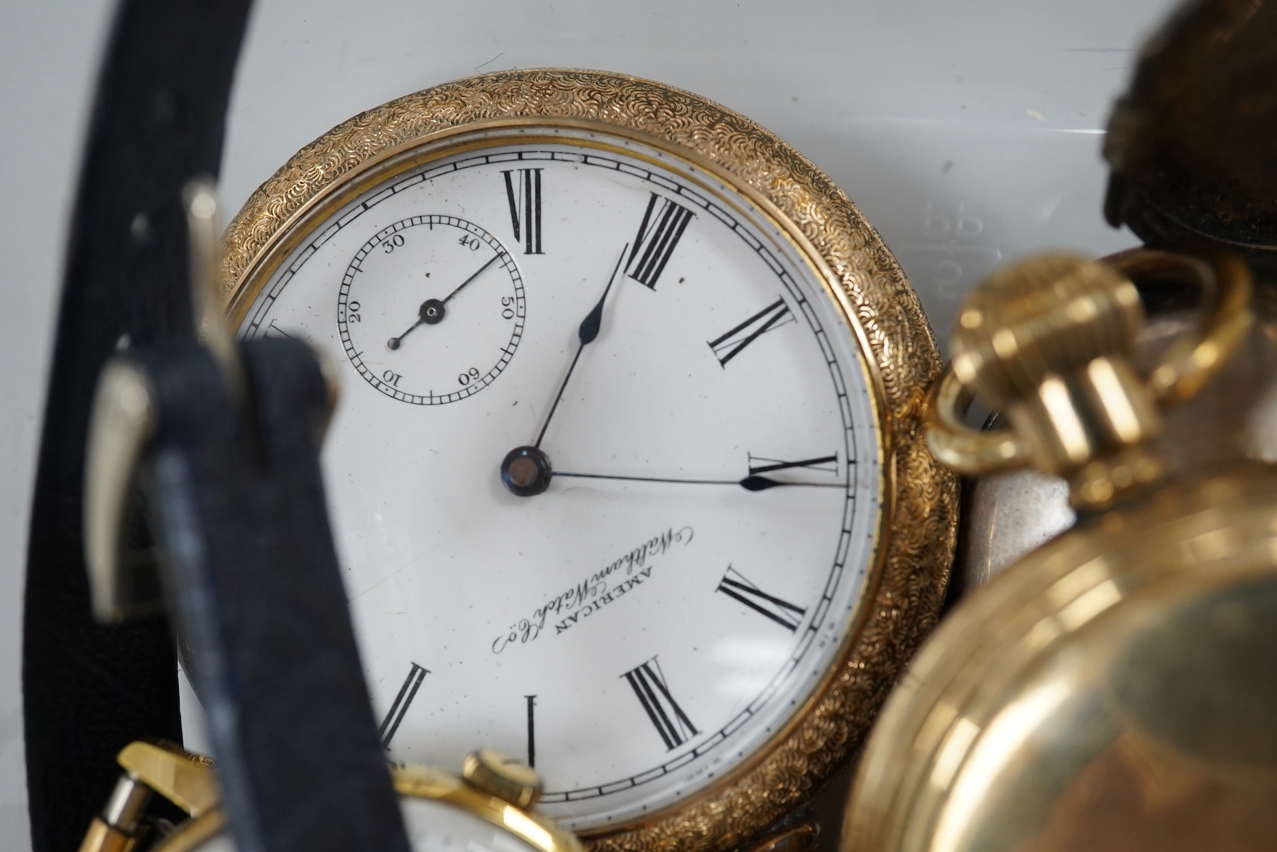 Seven assorted pocket and fob watches including a gold plated hunter by Thomas Russell & Son and an open faced Waltham, together with four other items including three wrist watches.